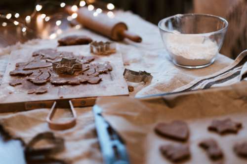 Cutting out gingerbread Christmas biscuits 7