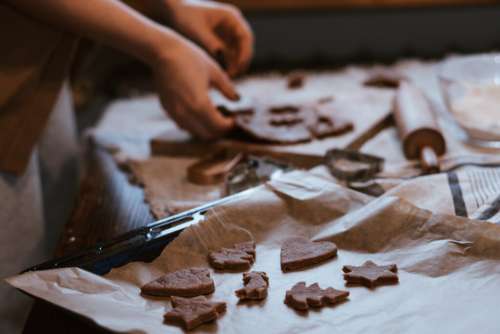 Cutting out gingerbread Christmas biscuits 10