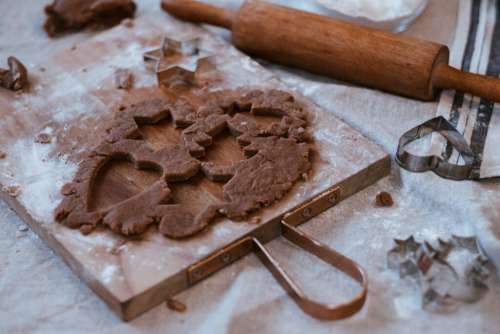 Cutting out gingerbread Christmas biscuits 11