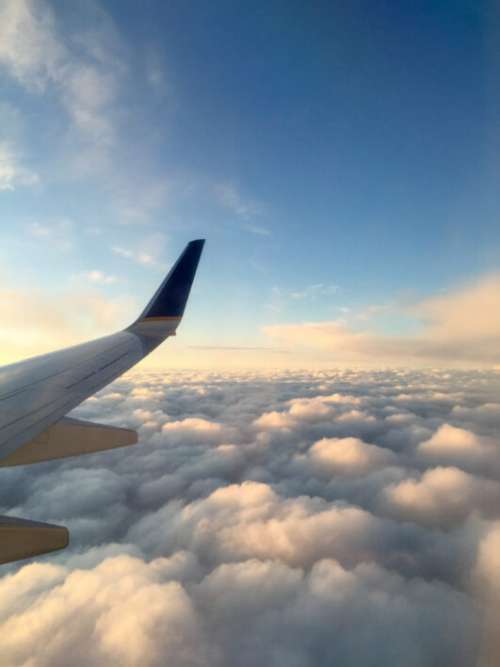 Airplane Sky Clouds Free Stock Photo