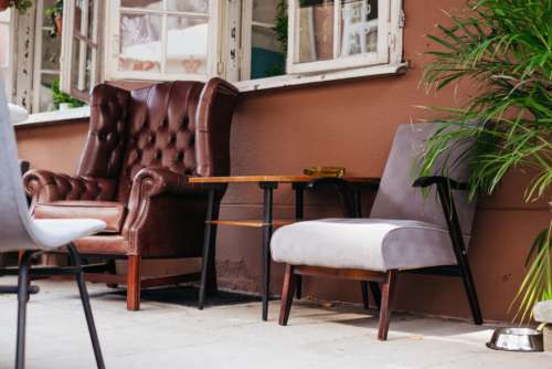 Vintage armchairs outside a cafe
