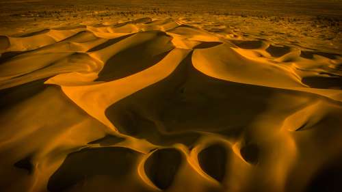 Abstract View Of Soft Yellow Sand Dunes Photo