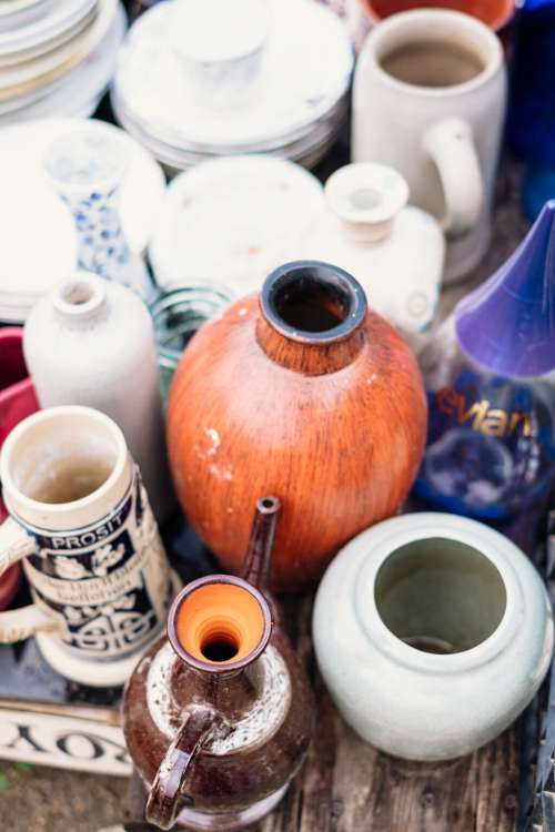Old vintage ceramic pots and vases at a flea market 3