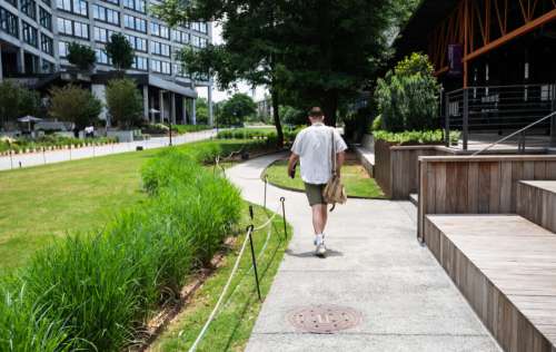 Walking Through Building Gardens Free Stock Photo