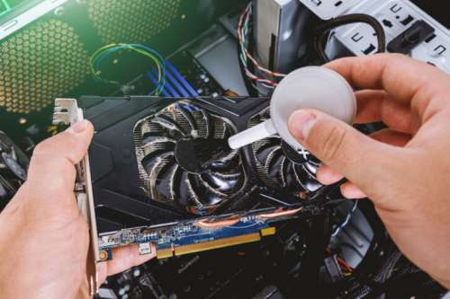 Cleaning dust from graphics card inside computer
